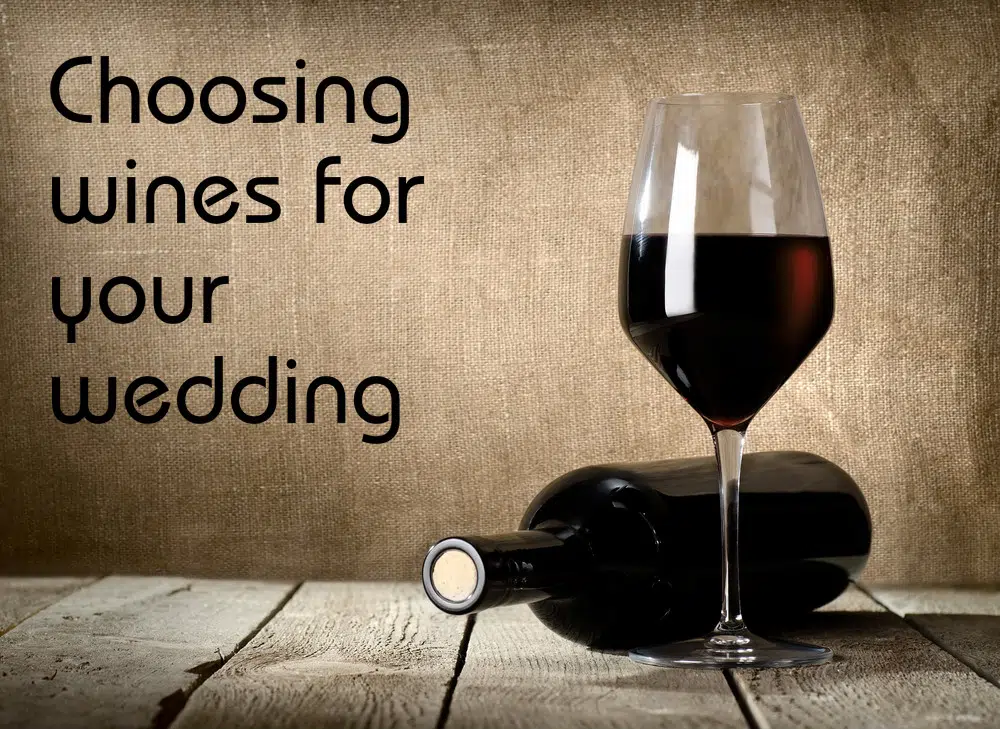 a bottle of red wine and a glass